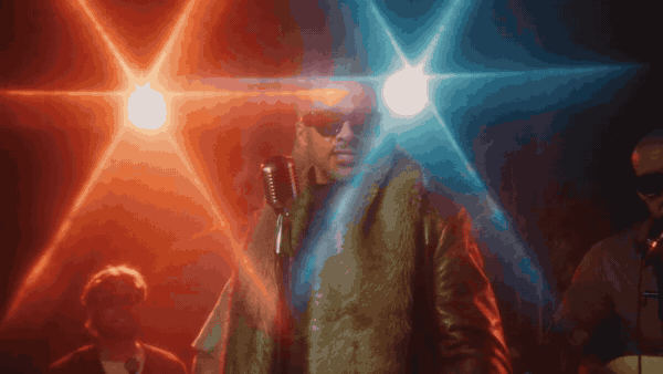 JRDN performing Down Home with Lane Hall under red and blue stage lights